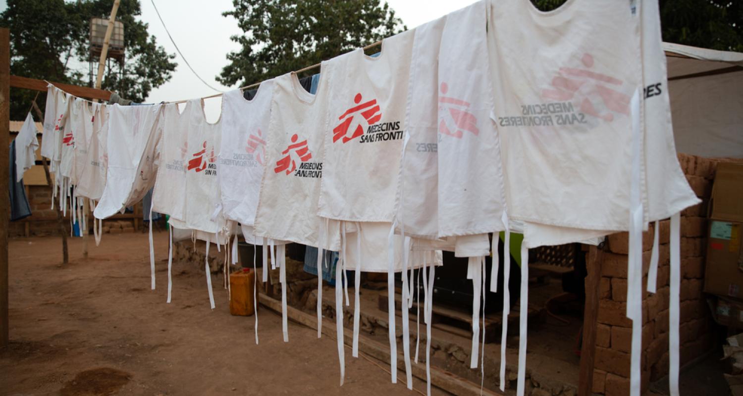 Doctors Without Borders staff vests hang out to dry at the site of the emergency measles vaccination team in Baboua. Central African Republic, 2020. © James Oatway