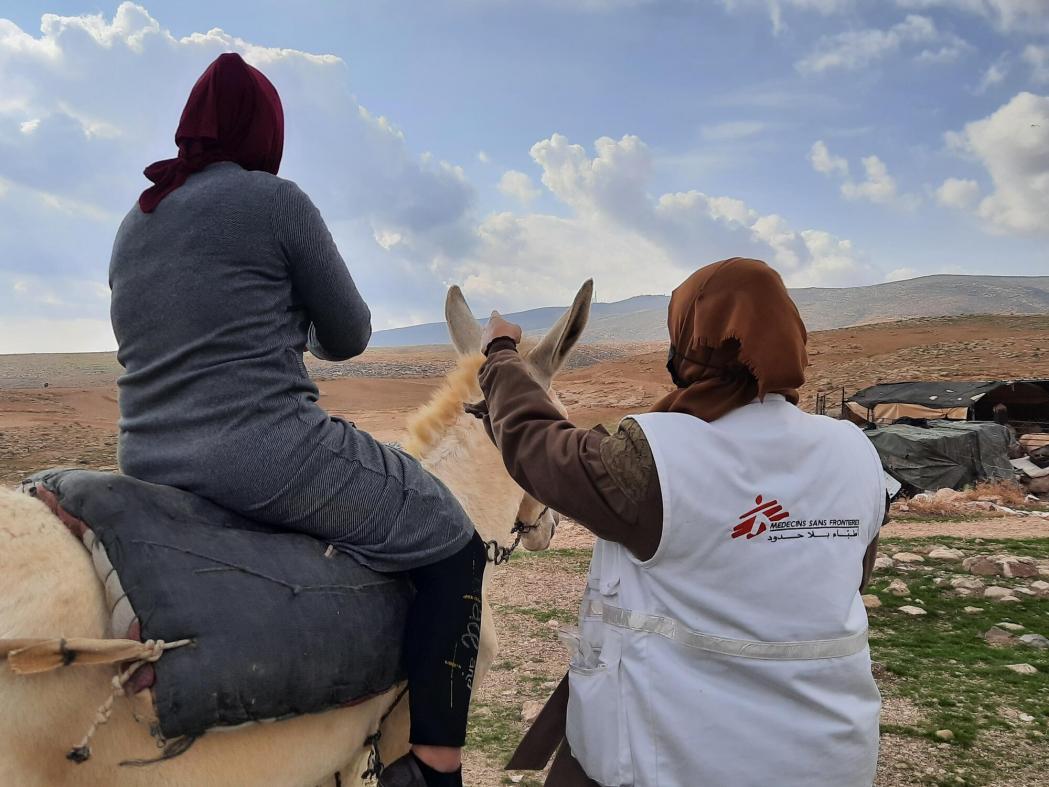 Rasha (fake name to protect patient’s anonimity) can see a difference since MSF mobile clinics started in the area where she lives. In absence of public transportation, she came to the clinic by donkey.©MSF/Katharina Lange