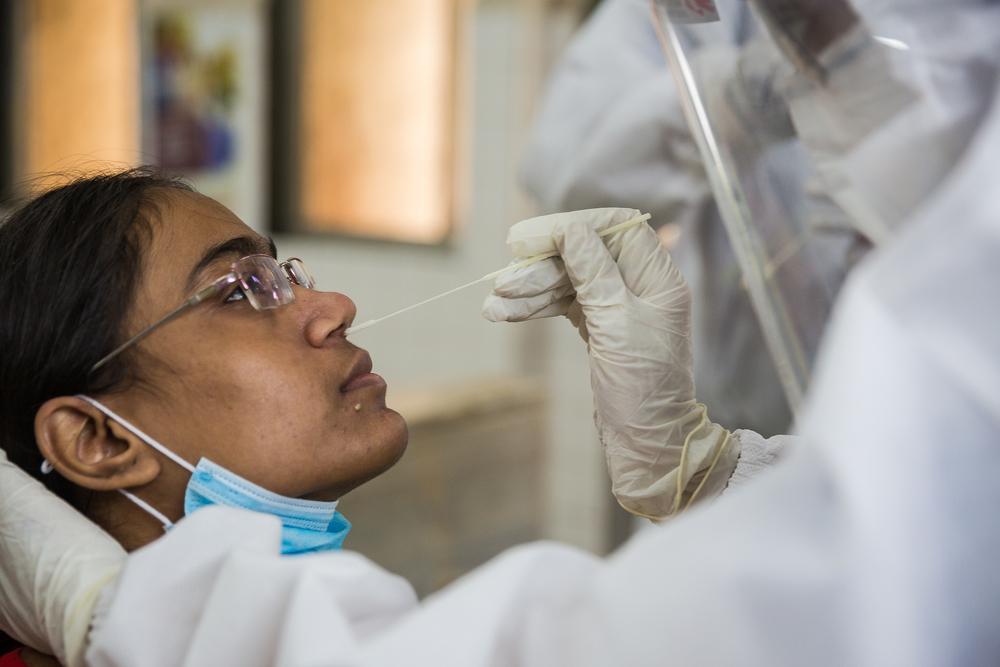 INDIA: taking a swab sample 