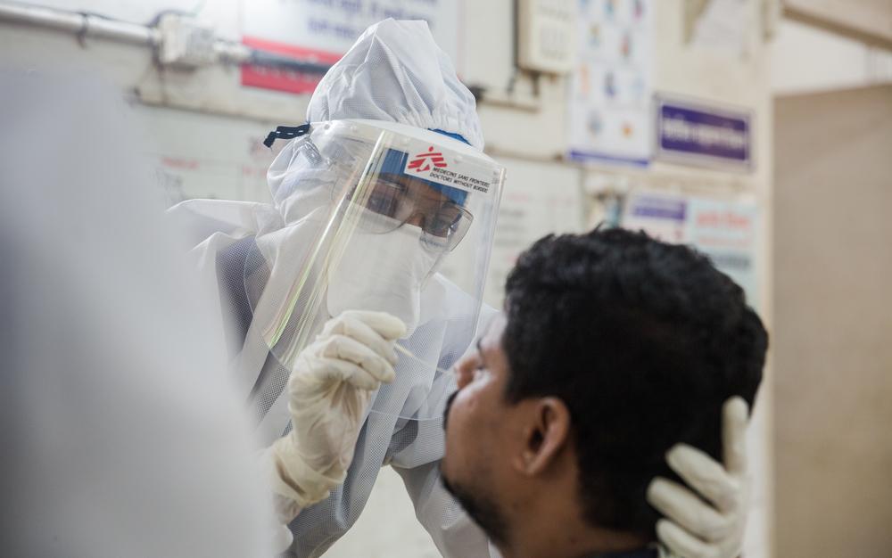 Dr Sharanya Ramakrishna, medical doctor taking a swab sample. Mumbai, India.