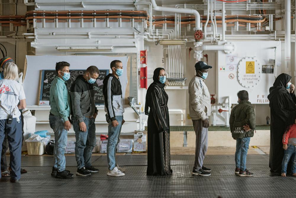 First medical assessment and triage of survivors of the first rescue on the 22nd of October, 2021. Mediterranean Sea, 2021. © Filippo Taddei/MSF 