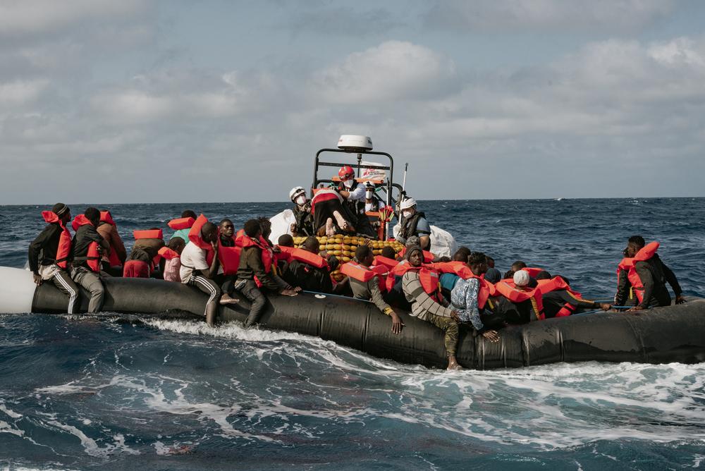 MSF teams transferring the 71 rescued people to the RHIBS, on the 24th of October. Mediterranean Sea, 2021. © Filippo Taddei/MSF 