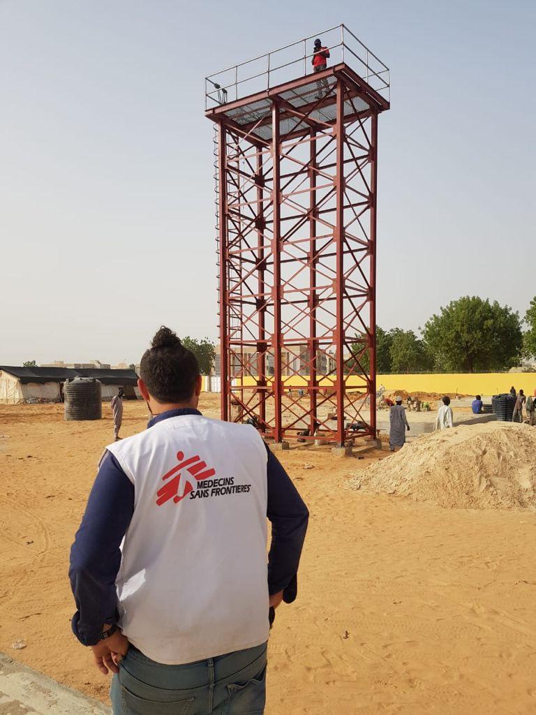 MSF construction manager checking the water tower structure of Nilefa Keji Hospital, March 2021, Nigeria. Photographer: Rodel Lambatin