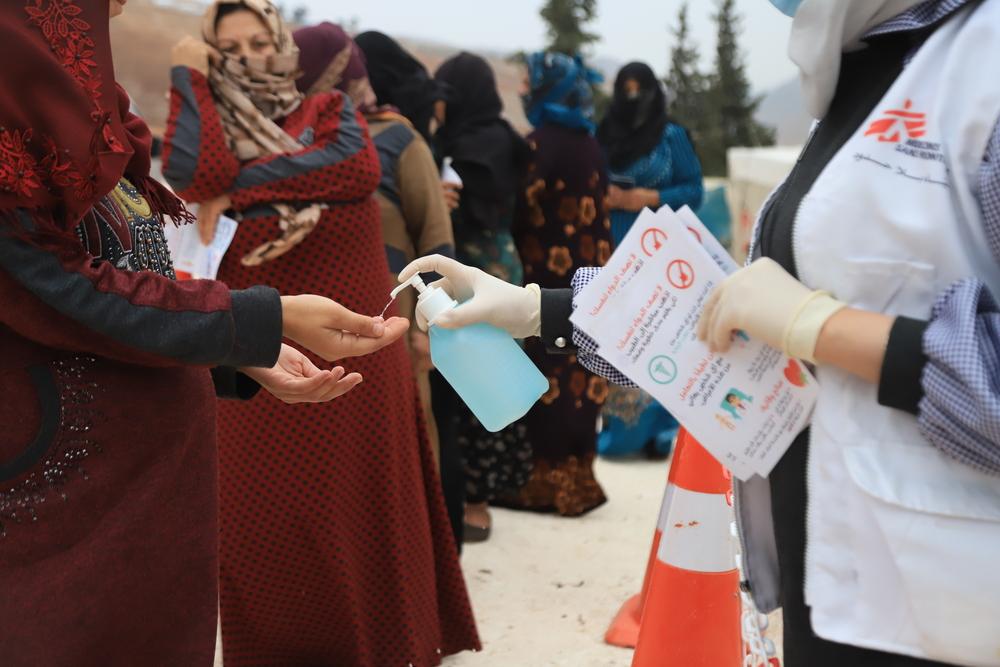 The Doctors Without Borders Health Promotion team spreads health awareness messages about common winter diseases, assesses people’s health needs, and informs them about Doctor Without Borders’ mobile clinic services. Syria, 2021. © MSF