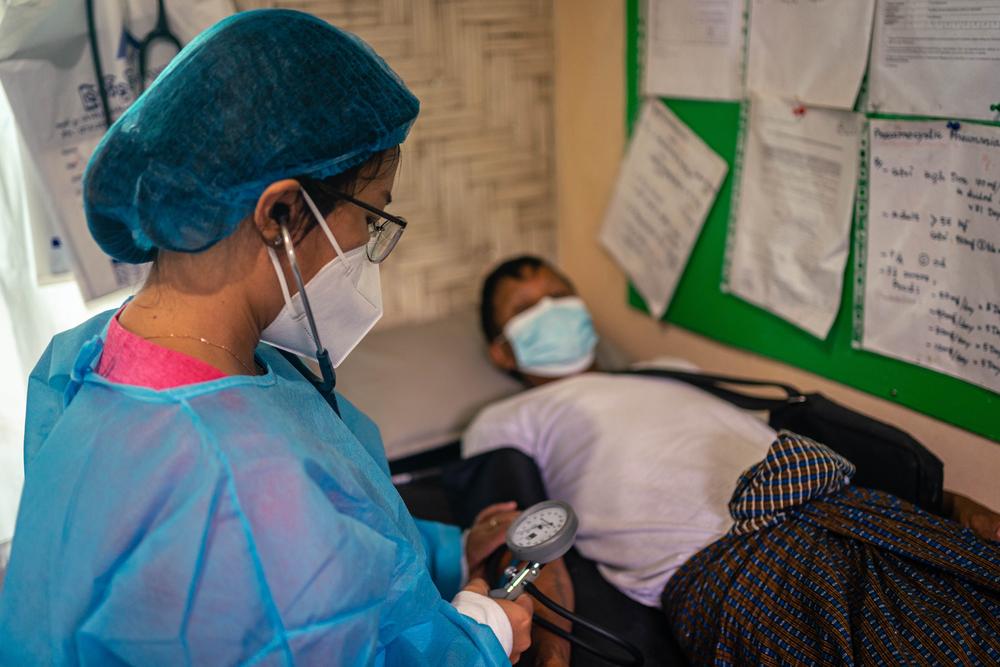 Naw Naw, 47, who has been receiving HIV services from MSF for 20 years, attends a consultation at MSF’s HIV clinic in Myitkyina, Kachin state. Myanmar, 2021.