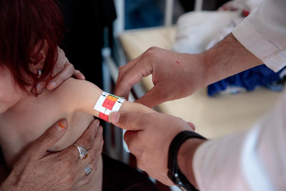 A malnourished child during a consulation at Doctors Without Borders' Kahdestan Clinic. 