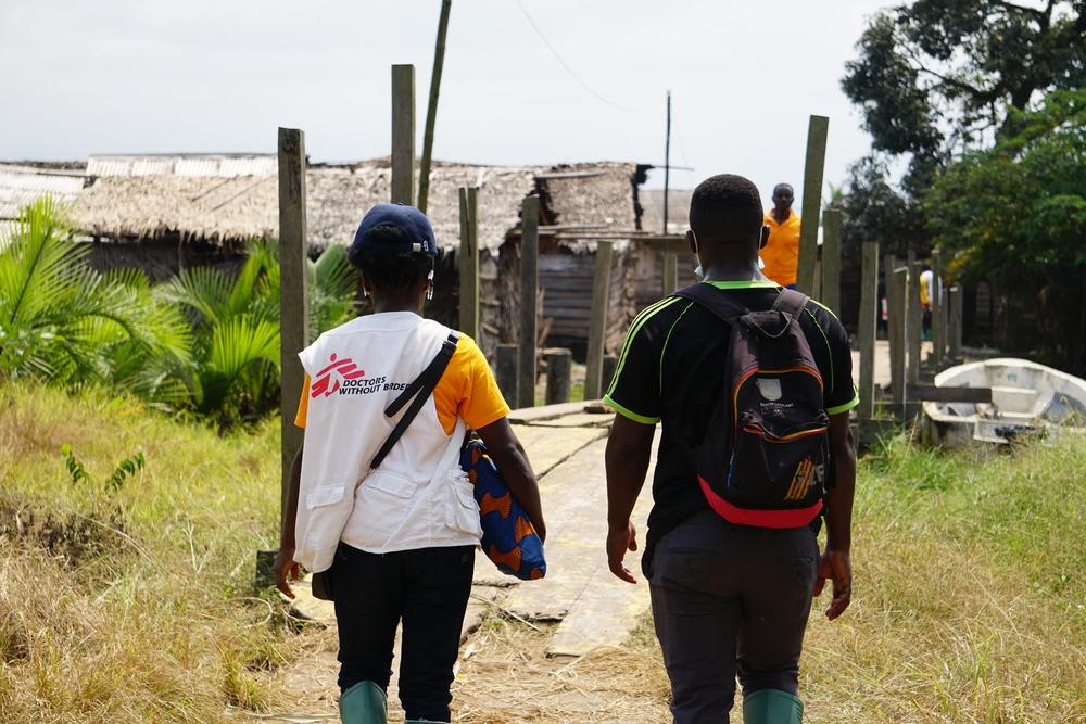 MSF Doctors Without Borders team entering Enyenge village during cholera vaccination campaign in the area.