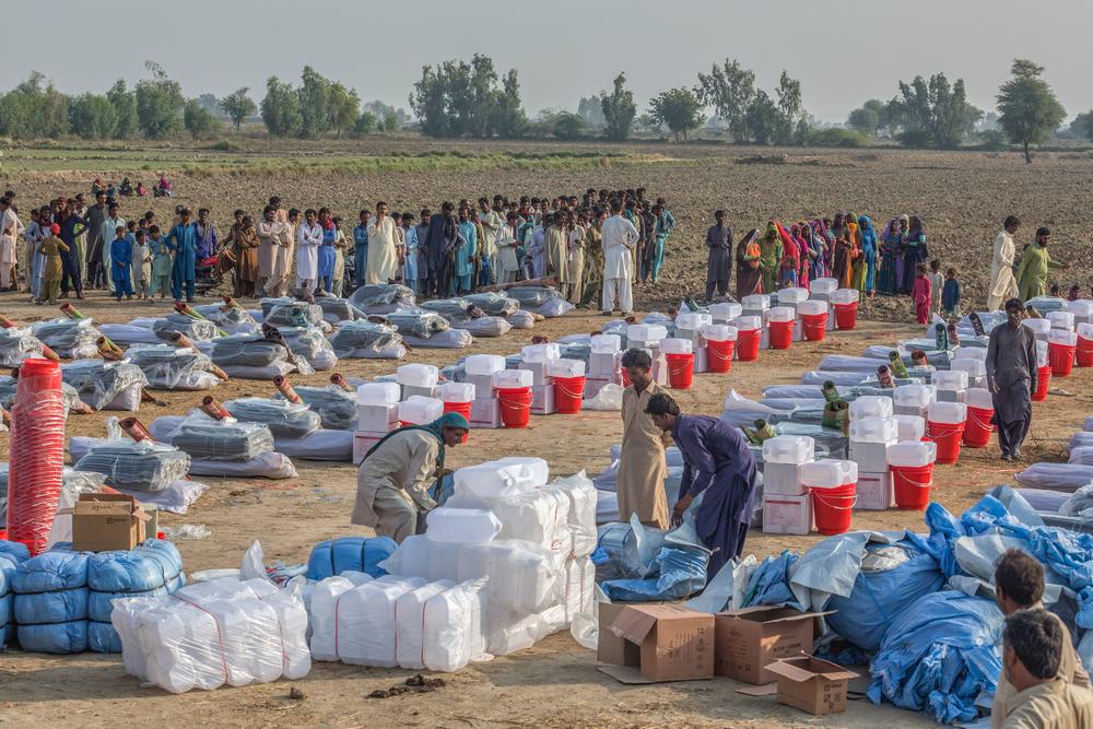 MSF staff and volunteers arranges Non Food Items (NFIs) kits for distribution
