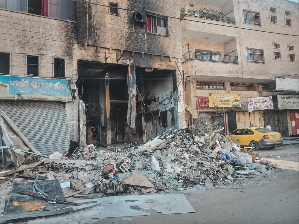 The remnants of a destroyed building in Jenin after an Israeli incursion on 1 November. The harrowing bloodshed in Gaza is spilling over into the West Bank, where 141 Palestinians have been killed since 7 October. West Bank, Palestinian Territories, November 2023. © Faris Al-Jawad/MSF