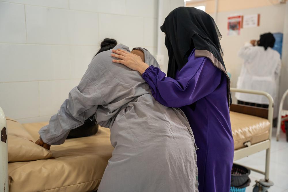 an MSF midwife, supporting Negah Abdallah Ali, 35, through her labour.