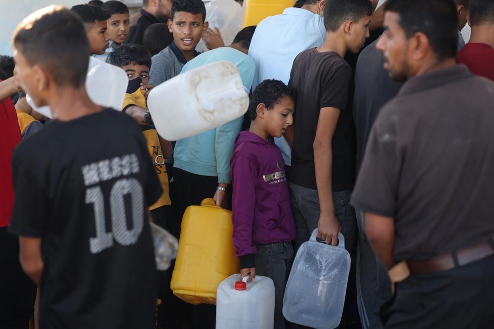People waiting for water
