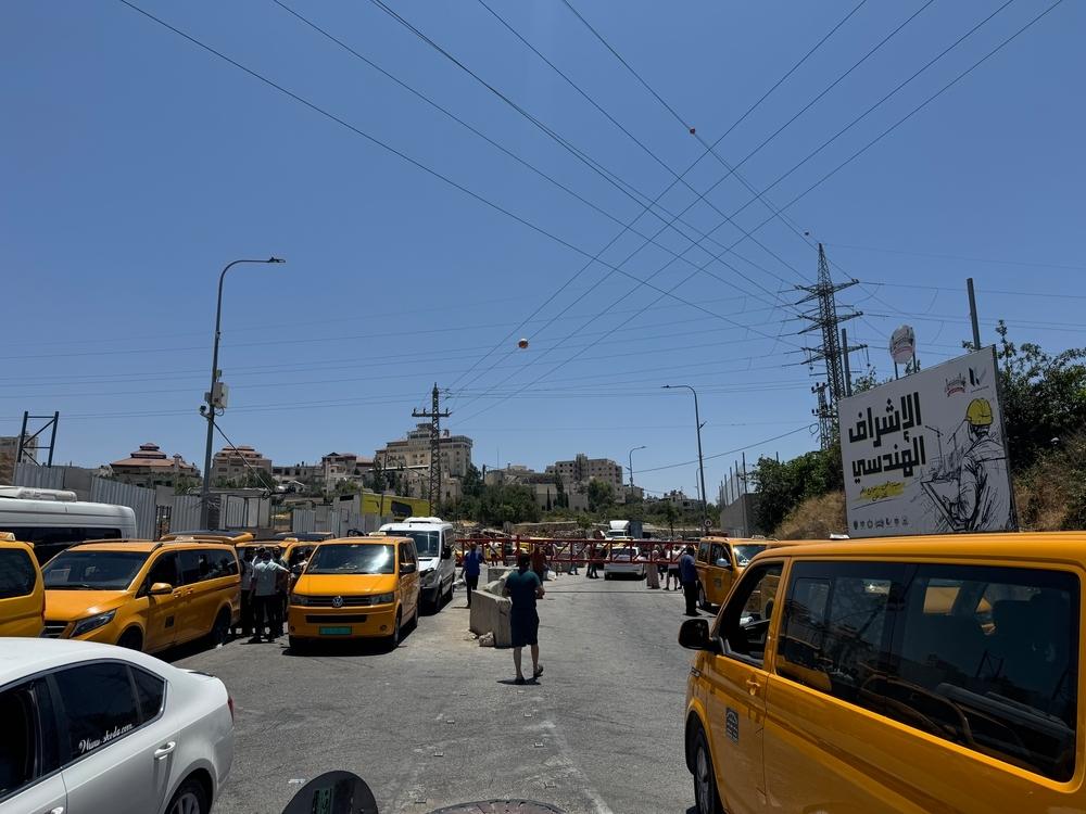 Cars stuck at Israeli gate