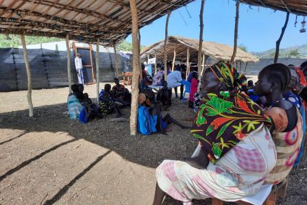 A chain of women surrounded us, spreading their clothes wide to keep us out of sight